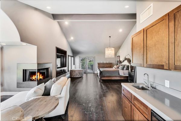 Chandelier, Fireplace, Interior, Living room, Pendant Lights, Recessed Lighting, Wood Texture Flooring