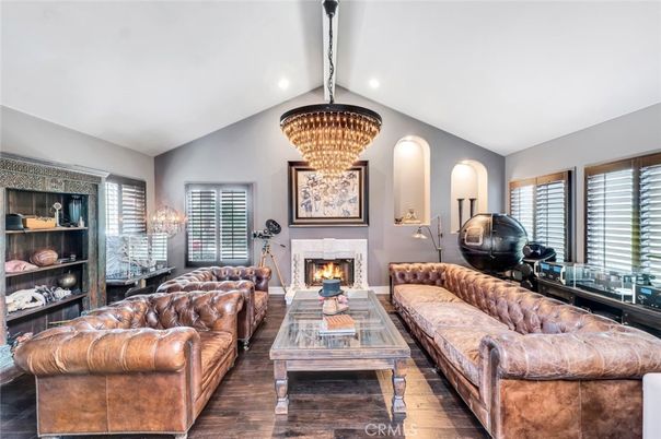 Chandelier, Fireplace, Interior, Living room, Recessed Lighting, Wood Texture Flooring