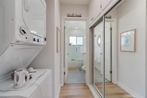 Bathroom, Interior, Recessed Lighting, Utility Closets, Washer, Wood Texture Flooring