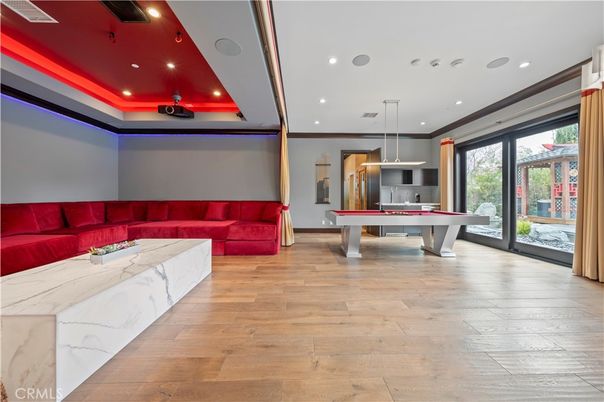 Billiard Table, Game Room, Interior, Living room, Pendant Lights, Recessed Lighting, Wood Texture Flooring
