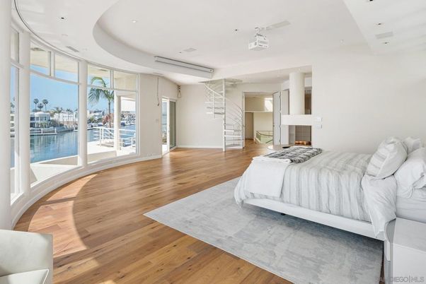 Bedroom, Fireplace, Interior, Recessed Lighting, Water, Wood Texture Flooring