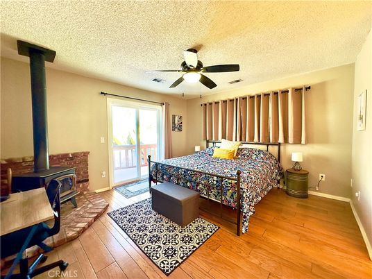 Bedroom, Fireplace, Interior, Wood Texture Flooring