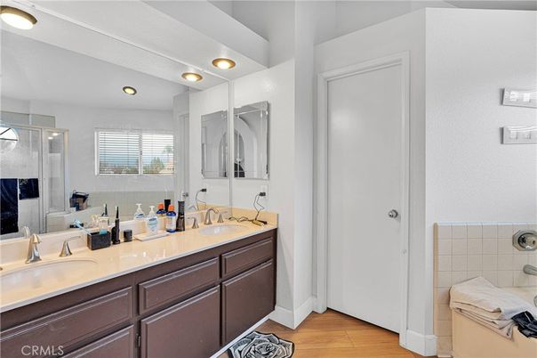 Bathroom, Dual Sink Vanities, Interior, Recessed Lighting, Wood Texture Flooring