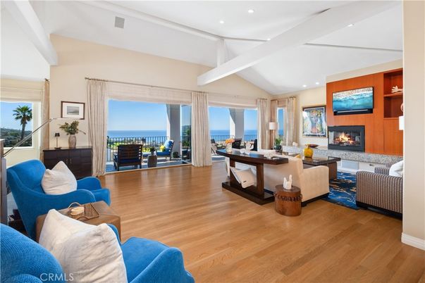 Fireplace, Interior, Living room, Recessed Lighting, Water, Wood Texture Flooring