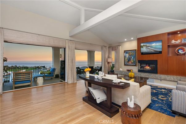 Fireplace, Interior, Living room, Recessed Lighting, Water, Wood Texture Flooring