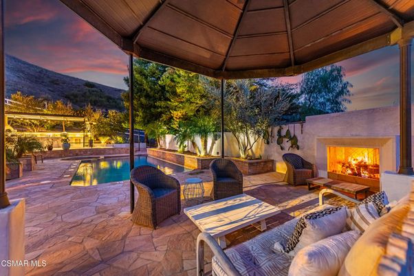 Exterior, Fireplace, Pool