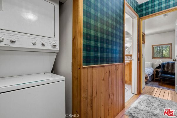 Interior, Utility Closets, Washer, Wood Texture Flooring, Wooden Walls