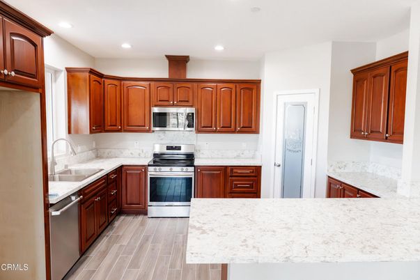 Interior, Kitchen, Recessed Lighting, Stainless Steel Appliances, Wood Texture Flooring