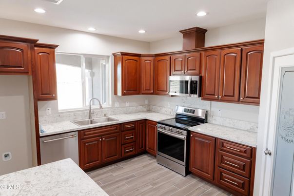 Interior, Kitchen, Recessed Lighting, Stainless Steel Appliances, Wood Texture Flooring