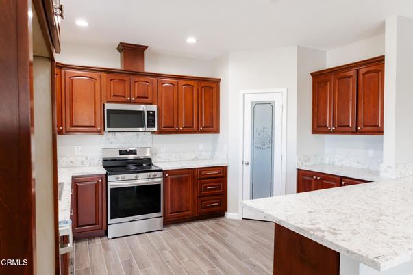 Interior, Kitchen, Recessed Lighting, Stainless Steel Appliances, Wood Texture Flooring