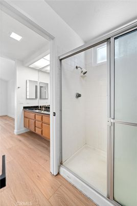 Bathroom, Glass Shower, Interior, Recessed Lighting, Wood Texture Flooring