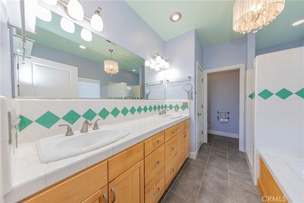 Bathroom, Dual Sink Vanities, Interior, Recessed Lighting, Tile Countertops