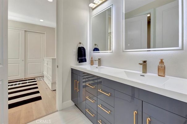 Bathroom, Dual Sink Vanities, Interior, Recessed Lighting, Wood Texture Flooring