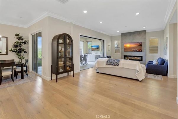 Dining room, Fireplace, Interior, Living room, Recessed Lighting, Wood Texture Flooring