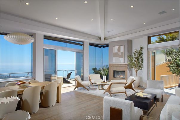 Dining room, Fireplace, Interior, Living room, Pendant Lights, Recessed Lighting, Water, Wood Texture Flooring
