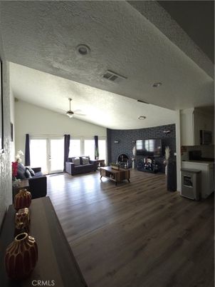 Fireplace, Interior, Kitchen, Living room, Recessed Lighting, Stone Walls, Wood Texture Flooring