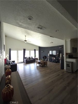 Fireplace, Interior, Kitchen, Living room, Recessed Lighting, Stone Walls, Wood Texture Flooring