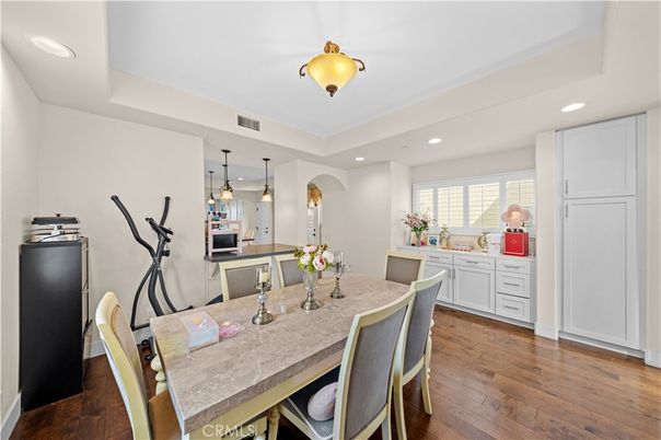 Dining room, Interior, Kitchen, Pendant Lights, Recessed Lighting, Stainless Steel Appliances, Wood Texture Flooring