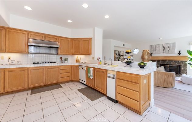 Fireplace, Interior, Kitchen, Living room, Recessed Lighting, Tile Countertops