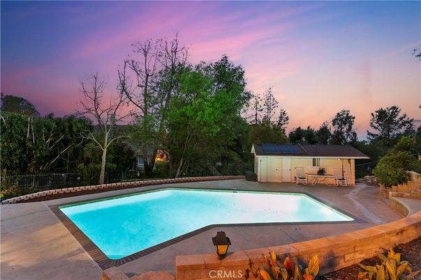 Exterior, Pool, Solar Panels