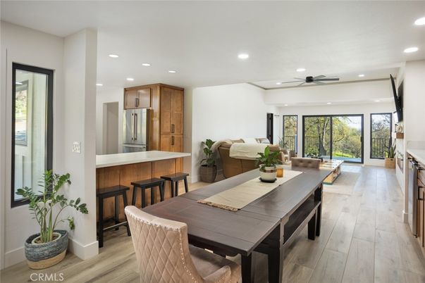 Dining room, Interior, Kitchen, Recessed Lighting, Stainless Steel Appliances, Wood Texture Flooring