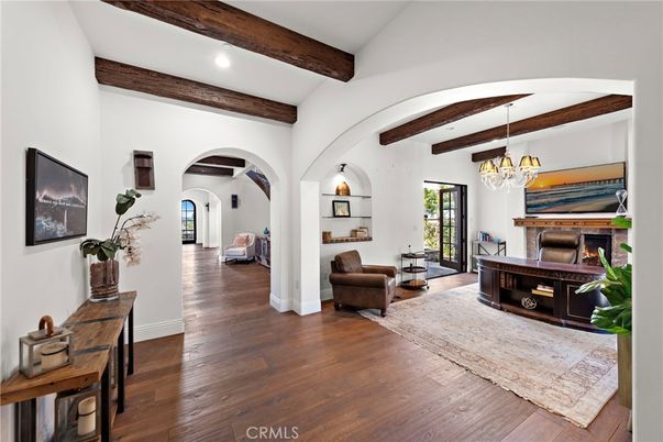 Chandelier, Fireplace, Interior, Recessed Lighting, Wooden Beams, Wood Texture Flooring