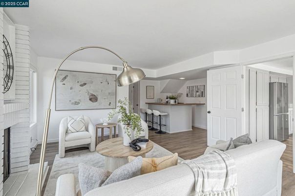 Fireplace, Interior, Kitchen, Living room, Recessed Lighting, Stainless Steel Appliances, Wood Texture Flooring