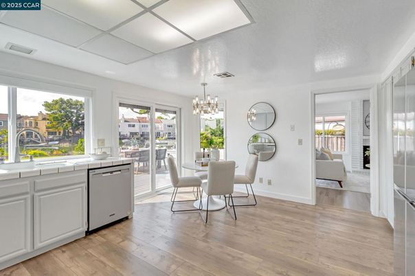 Chandelier, Dining room, Interior, Kitchen, Pendant Lights, Tile Countertops, Wood Texture Flooring
