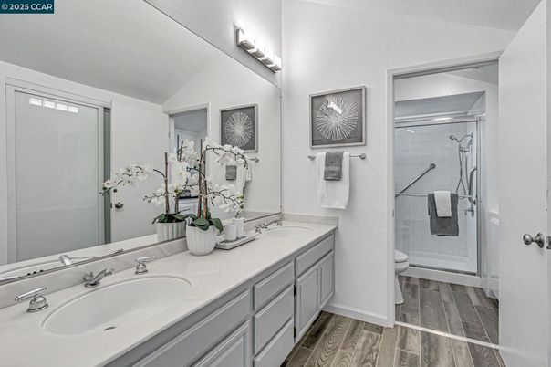 Bathroom, Dual Sink Vanities, Glass Shower, Interior, Wood Texture Flooring