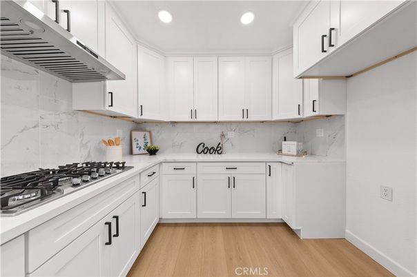 Interior, Kitchen, Marble Walls, Recessed Lighting, Wood Texture Flooring