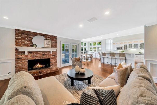 Dining room, Fireplace, Interior, Kitchen, Living room, Recessed Lighting, Stone Walls, Wood Texture Flooring