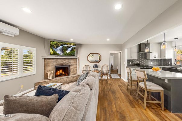 Dining room, Fireplace, Interior, Kitchen, Living room, Pendant Lights, Recessed Lighting, Wood Texture Flooring