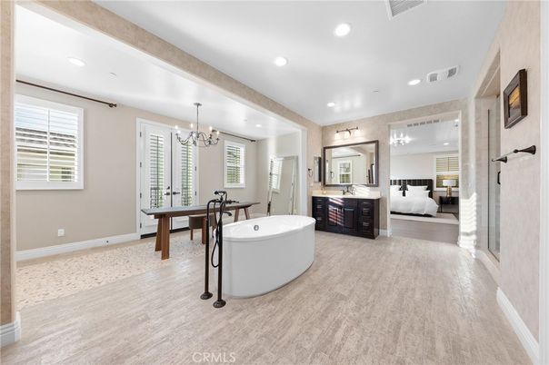 Bathroom, Bedroom, Chandelier, Dual Sink Vanities, Free Standing Baths, Interior, Recessed Lighting, Wood Texture Flooring