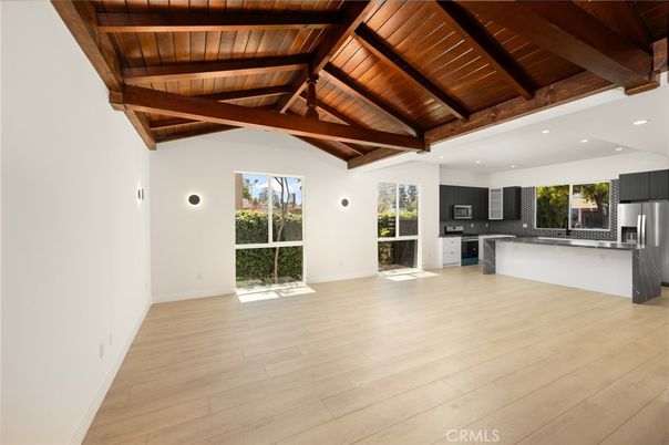 Empty room, Interior, Kitchen, Recessed Lighting, Stainless Steel Appliances, Wooden Beams, Wooden Ceilings, Wood Texture Flooring