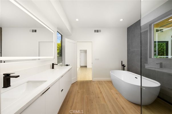 Bathroom, Dual Sink Vanities, Free Standing Baths, Interior, Recessed Lighting, Wood Texture Flooring