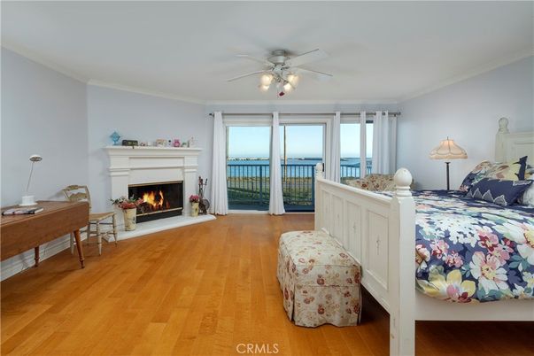 Bedroom, Fireplace, Interior, Water, Wood Texture Flooring