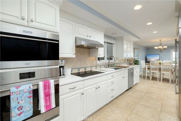 Chandelier, Dining room, Interior, Kitchen, Recessed Lighting, Stainless Steel Appliances, Tile Countertops