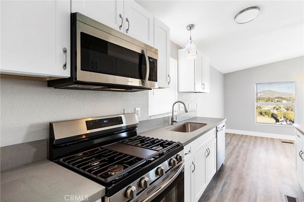 Interior, Kitchen, Pendant Lights, Stainless Steel Appliances, Wood Texture Flooring
