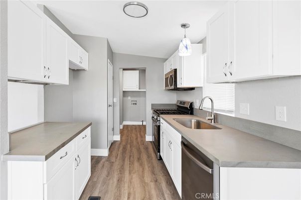 Interior, Kitchen, Pendant Lights, Stainless Steel Appliances, Wood Texture Flooring