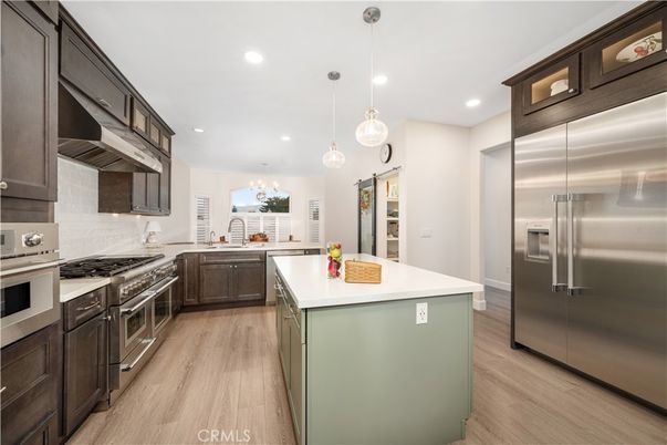 Interior, Kitchen, Pendant Lights, Recessed Lighting, Stainless Steel Appliances, Wood Texture Flooring