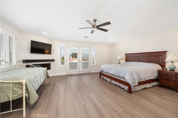 Bedroom, Fireplace, Interior, Recessed Lighting, Wood Texture Flooring