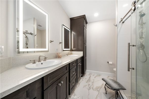 Bathroom, Dual Sink Vanities, Glass Shower, Interior, Marble, Recessed Lighting