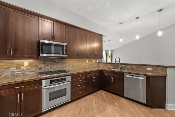 Interior, Kitchen, Pendant Lights, Stainless Steel Appliances, Wood Texture Flooring