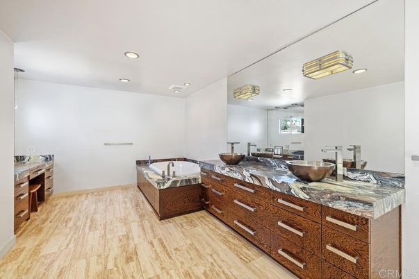 Bathroom, Dual Sink Vanities, Interior, Recessed Lighting, Wood Texture Flooring
