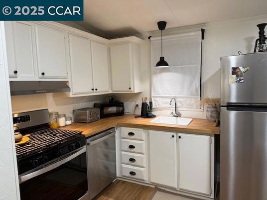 Interior, Kitchen, Pendant Lights, Stainless Steel Appliances, Wood Texture Flooring