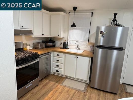 Interior, Kitchen, Pendant Lights, Stainless Steel Appliances, Wood Texture Flooring