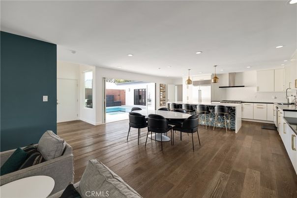 Dining room, Interior, Kitchen, Pendant Lights, Recessed Lighting, Stainless Steel Appliances, Wood Texture Flooring