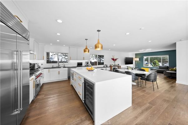 Dining room, Interior, Kitchen, Pendant Lights, Recessed Lighting, Stainless Steel Appliances, Wood Texture Flooring