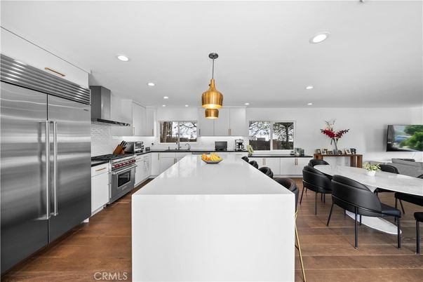 Dining room, Interior, Kitchen, Pendant Lights, Recessed Lighting, Stainless Steel Appliances, Wood Texture Flooring