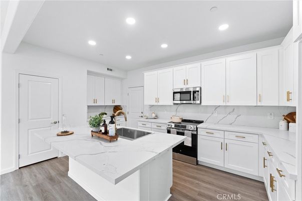 Interior, Kitchen, Recessed Lighting, Stainless Steel Appliances, Wood Texture Flooring